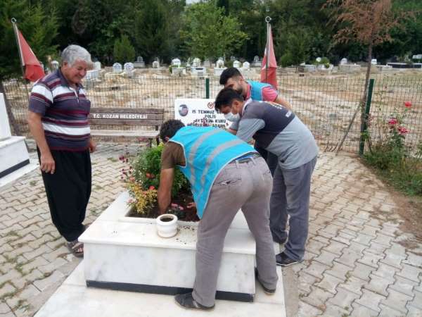 Yükümlülerden şehit mezarlarına bakım ve temizlik 