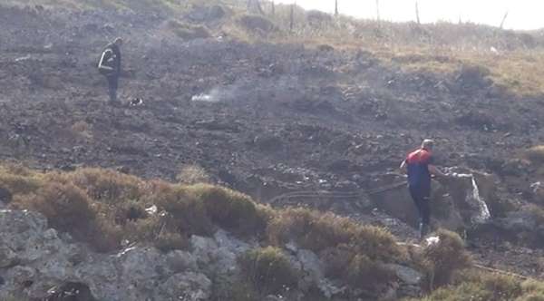 Sinop'ta çalılık alanda çıkan yangında kalan bir kadın, itfaiye ekiplerince kurtarıldı