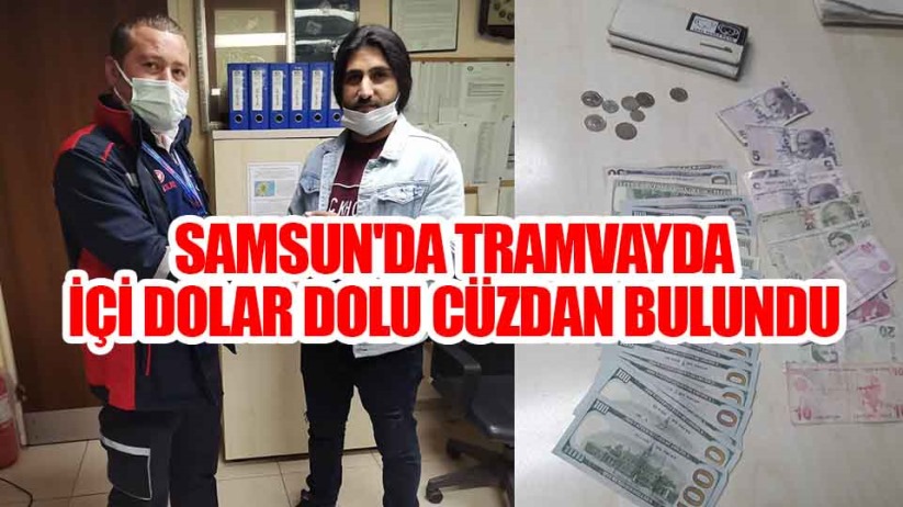 Samsun'da tramvayda unutulan içi dolar dolu cüzdan sahibine ulaştırıldı