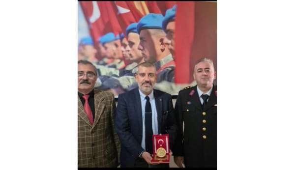 Hayırsever iş insanına altın madalya ve berat