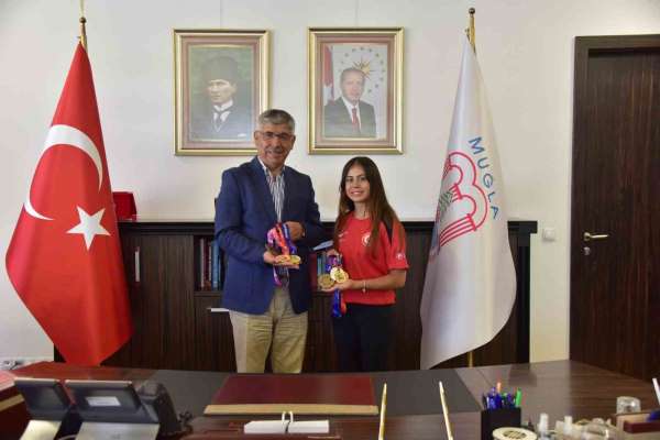 MSKÜ'lü milli sporcu Burun'dan madalya ziyareti