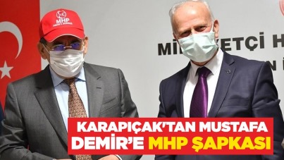 Karapıçak'tan Mustafa Demir'e MHP şapkası