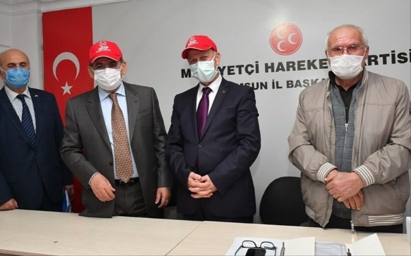 Karapıçak'tan Mustafa Demir'e MHP şapkası