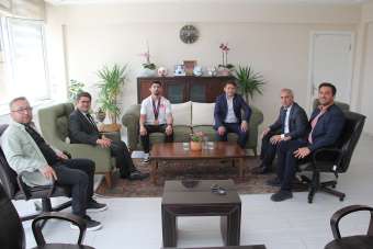 Şampiyon Kamal'dan Kaymakam Özdemir ve Başkan Dönmez'e ziyaret