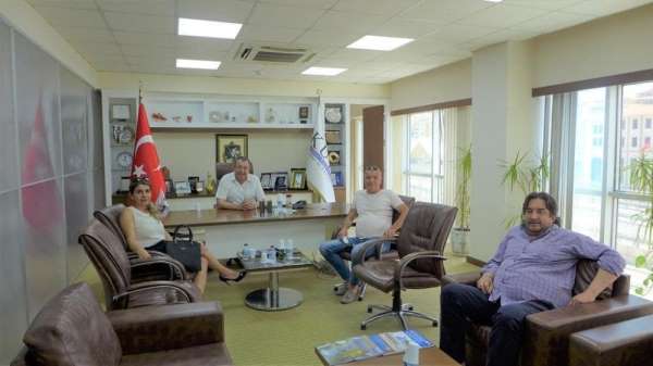 TÜRSAB yönetimi KUTO Başkanı Serdar Akdoğan'ı ziyaret etti 