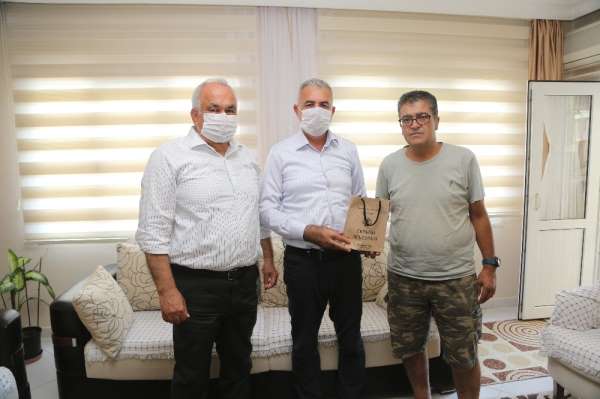 Başkan Tollu'dan şehit babalarına ziyaret