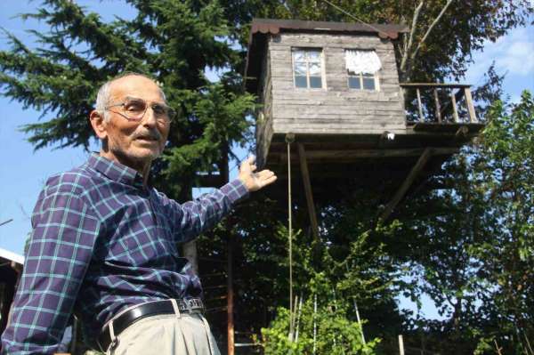 Torunu istedi, dedesi yaptı: 90 yıllık meşe ağacının tepesine ev kurdu