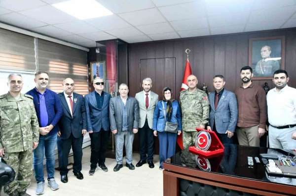 Şehit aileleri ve gazilerden Albay Altınok'a anlamlı ziyaret