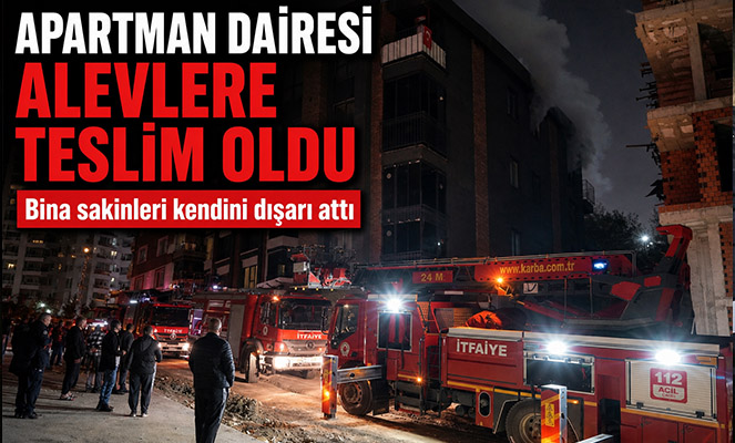 Apartman dairesi alevlere teslim oldu, bina sakinleri kendini dışarı attı