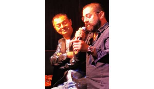 Serkan Aslan, Serdar Ortaç konserinde şiirleriyle geceye damgasını vurdu