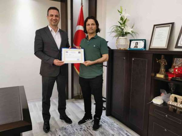 Kozan Kaymakamı Günçam, Gültekin'i ödüllendirdi - Adana haber