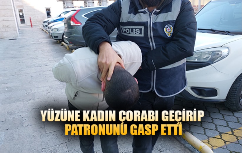 Yüzüne kadın çorabı geçirip patronunu gasp etti